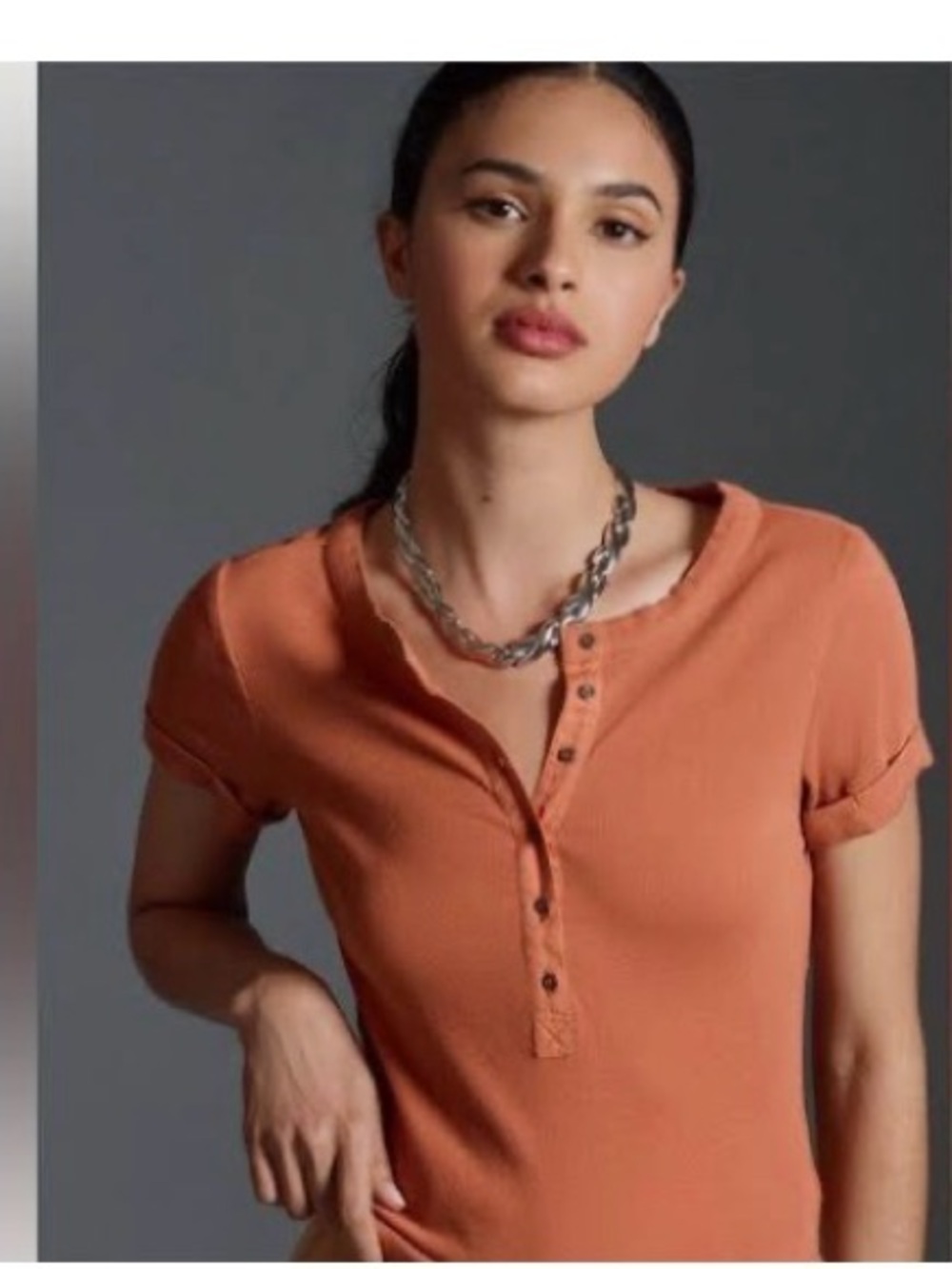 The Andie Ribbed Henley Top by Pilcro in the color cedar. M